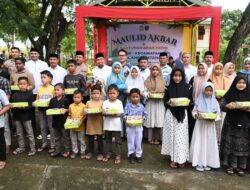 Pj Bupati Aceh Besar Beri Santunan kepada 114 Anak Yatim pada Maulid Akbar Blang Bintang