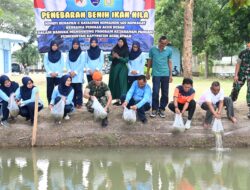 DKP Aceh Besar Lepas Bibit Ikan Dikolam Kopasgat 469 Lanud SIM