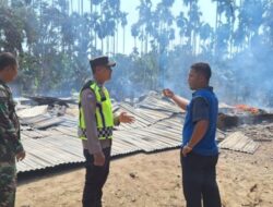 Rumah Kontruksi Kayu di Langkahan Dilahap Sijago Merah