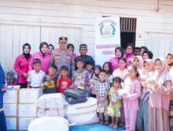 AKBP Ahzan Serahkan Bantuan di Nisam